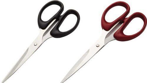 Close-up of H-607 scissors cutting through fabric