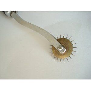Different angles of the wooden tracing wheel for crafting