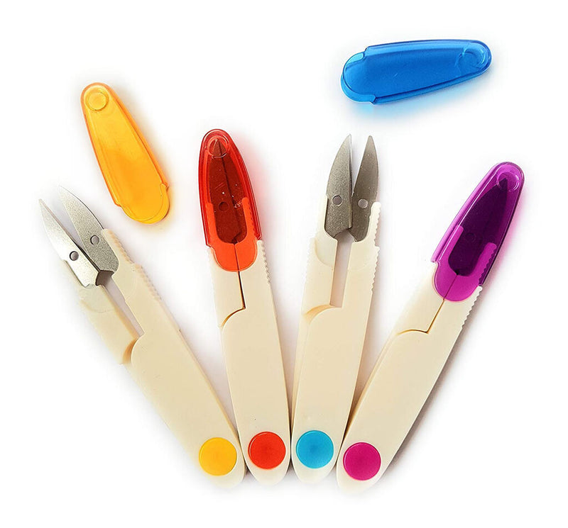 4.5 inch thread snips with protective cover on a wooden table