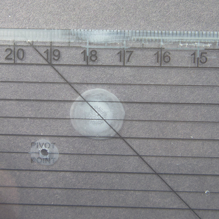 Side view of the ruler highlighting its length and design.