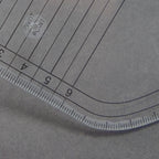 Ruler placed on fabric for pattern marking demonstration.