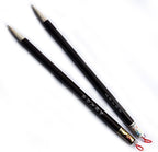Two wooden sumi brushes displayed on a white background.