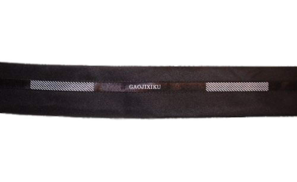 Black and white tailor waist band trim displayed on a roll.