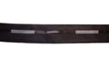Black and white tailor waist band trim displayed on a roll.