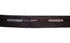 Black and white tailor waist band trim displayed on a roll.