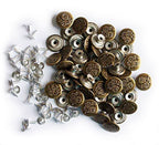 Vintage gold No6 jeans buttons displayed on a white background