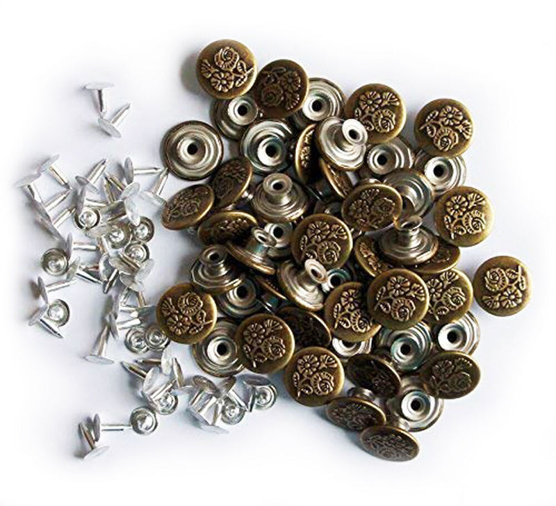 Vintage gold No6 jeans buttons displayed on a white background