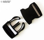 Close-up of a black plastic quick release buckle