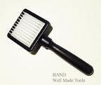 Fur care brush with plastic bristles for cleaning