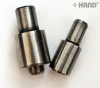 Button dies and short cutter set displayed on a table