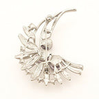 Close-up of the brooch showcasing the intricate bead detailing.