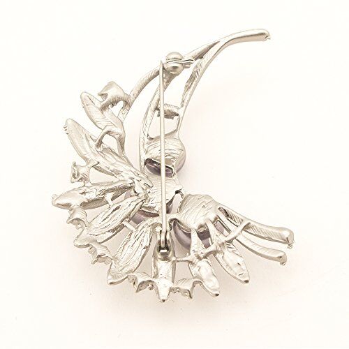 Close-up of the brooch showcasing the intricate bead detailing.