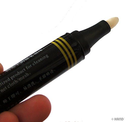 Close-up of a stain remover pen for leather and fabric use