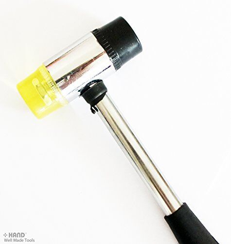 Rubber mallet in use during a DIY camping project