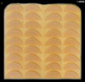Tan rubber repair heel sole sheet showing 18 pairs