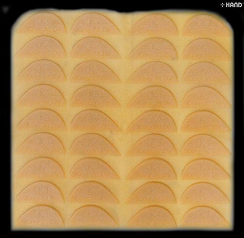 Close-up of tan shoe rubber repair material