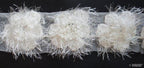 Close-up of decorative white angel flower net trim