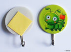 Three colourful kids cartoon self-adhesive hooks on display