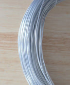 Craft wire in a spool, ideal for various jewellery making projects.