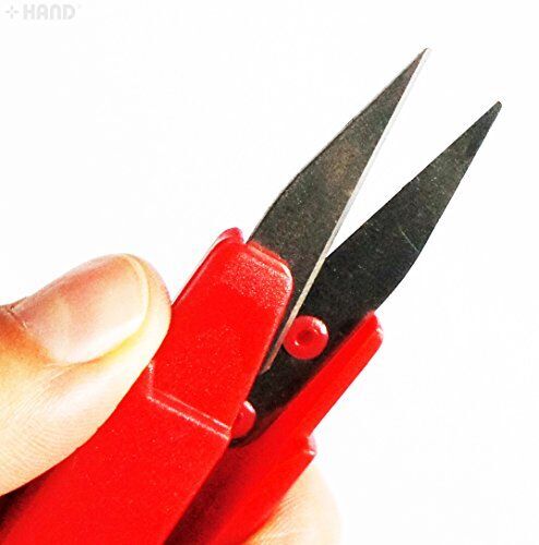 Close-up of the sharp blades of the thread snips