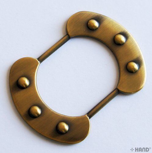 Vintage gold tone handbag buckle measuring 65x47mm.