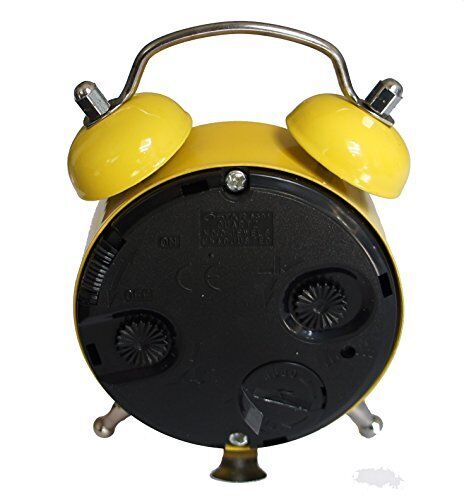 Side view of the yellow alarm clock showing its design