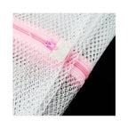 Mesh bag demonstrating ample flow for suds and water