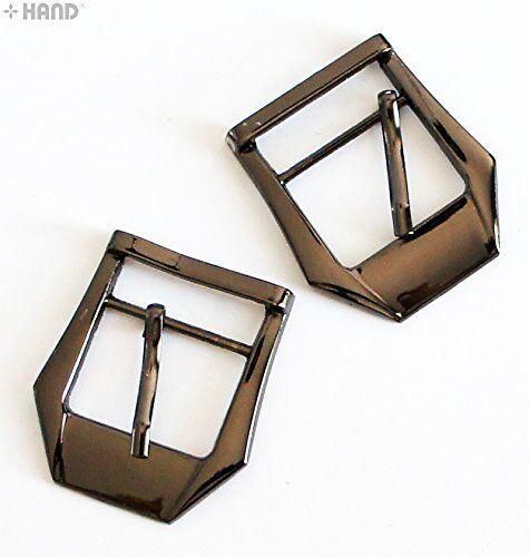 Gunmetal tone buckle displayed on a fabric background