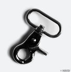 Four rotary swivel hook buckles arranged neatly in a pack
