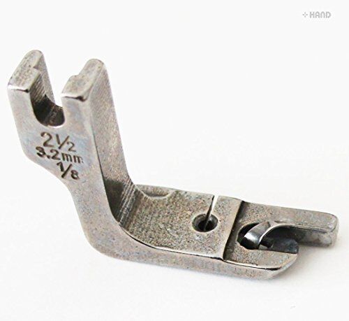 Hemming foot attached to a sewing machine with fabric