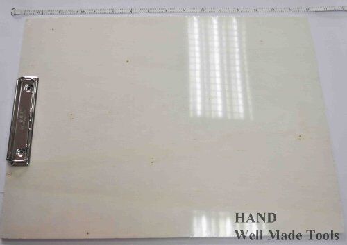 Clipboard holding sheets of paper for drawing
