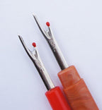 Unpicker in use, demonstrating its seam unpicking capability.
