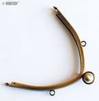 Different angles of the vintage gold purse frame displayed.