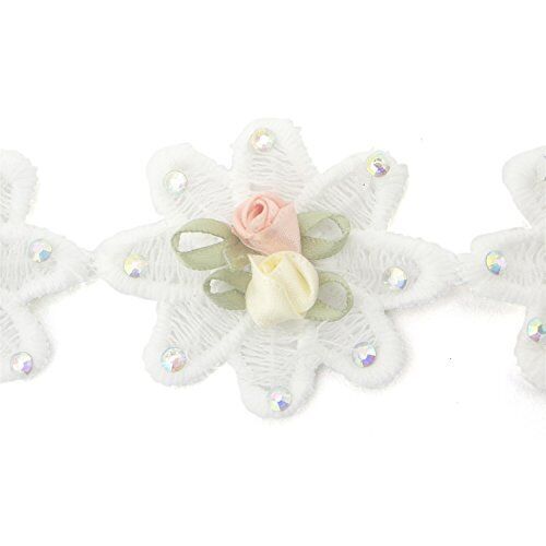 Close-up of 3D flower trim featuring pink and cream ribbon roses.