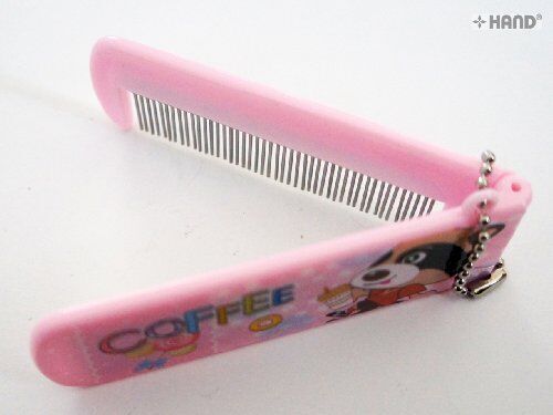 Brightly coloured children's hair brush with fun graphics