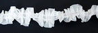 Ruffle trim displayed on a sewing project for decorative effect.