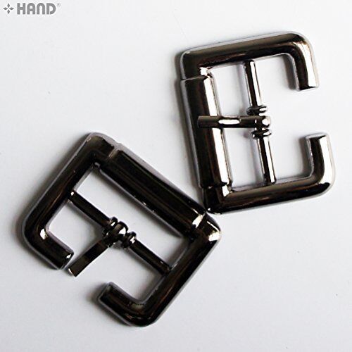 Assorted colours of 23mm metal shoe buckles arranged neatly.