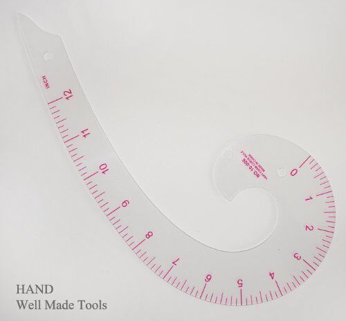 Close-up of the curve ruler showing its design and markings.
