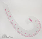 Close-up of the curve ruler showing its design and markings.