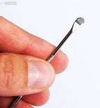 Earpicks arranged neatly in a pack for sale.