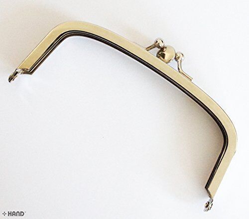 Double opening medium silver purse frame with balls clasp.