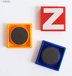 Close-up of a 3.5cm magnetic letter on a surface