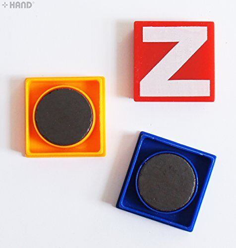 Close-up of a 3.5cm magnetic letter on a surface