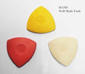 Assorted colours of 20 pieces of tailors chalk displayed together.