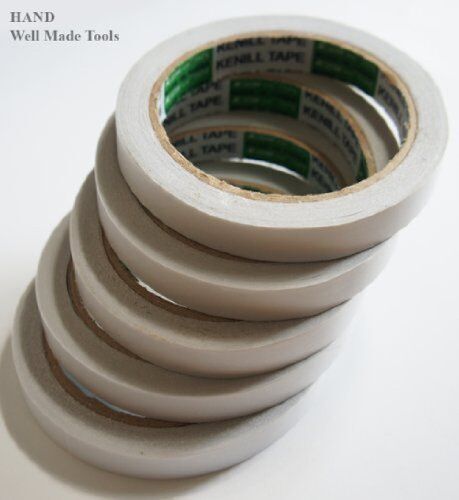 Five rolls of economy removable double sided tape, 10mm width.