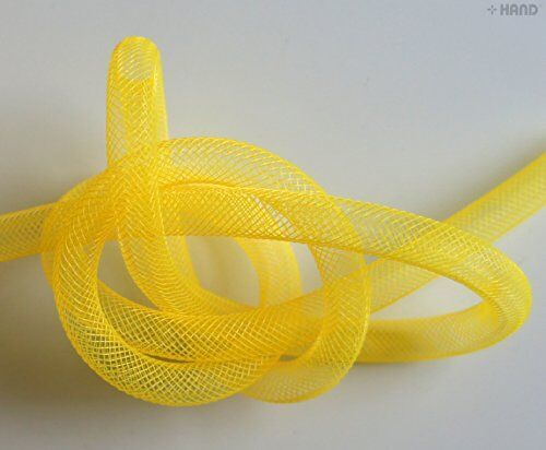 Yellow tubular crin trim displayed alongside crafting tools