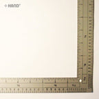 Side view of the aluminium ruler highlighting its thickness