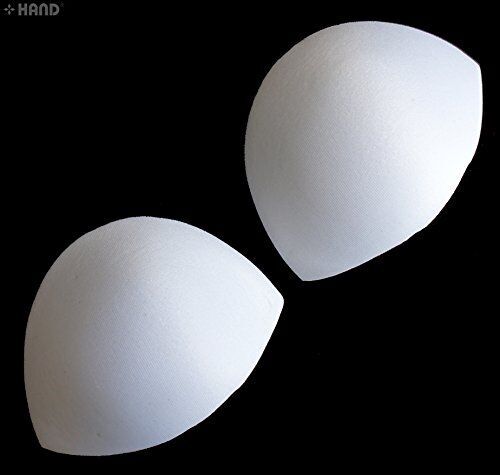Two pairs of white replacement bra pads displayed on a flat surface.