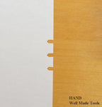 Pattern notcher punch in use on fabric pattern
