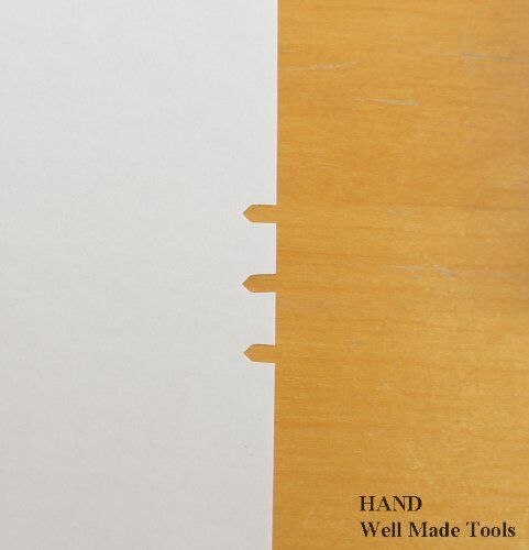 Pattern notcher punch in use on fabric pattern